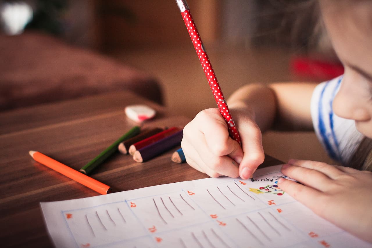 How can children improve their writing skills?
